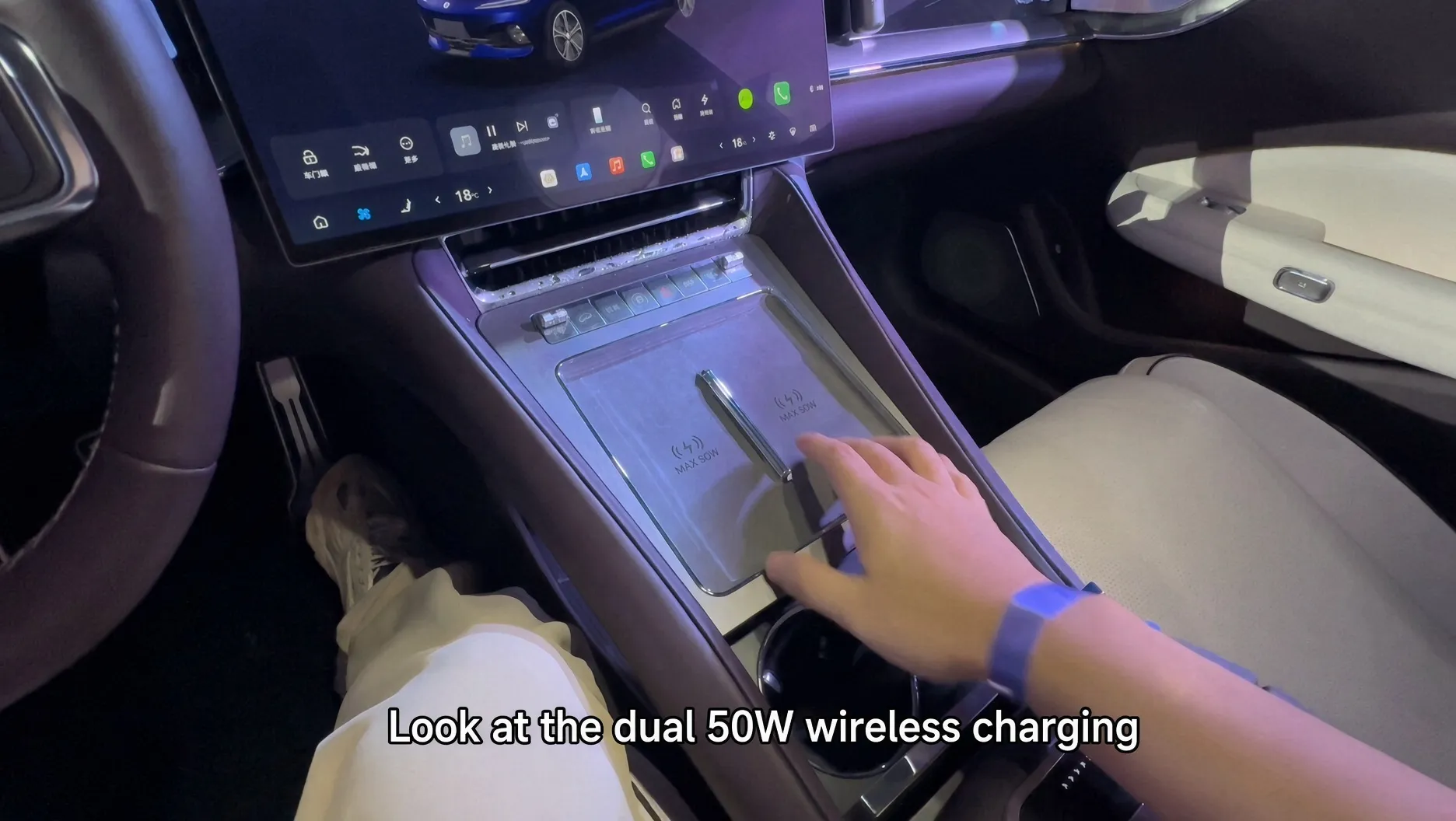 Denza Z9S centre console with two 50 W wireless charging pads under a sliding cover