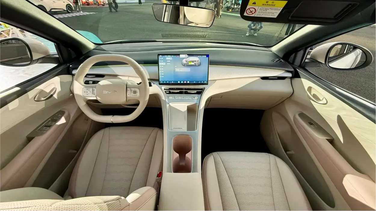 The cabin of a display car photographed through the open door